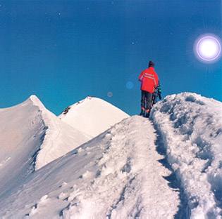 Dario Mosconi, climbing 4,223 meters above sea level, approaches the summit of Mount Castore